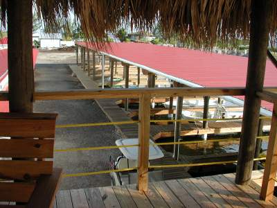 Listing ID: URE0367, Blue Bayou Utila, Bay Islands, HN - Boat Slip and Garage at the Palms, Photo #