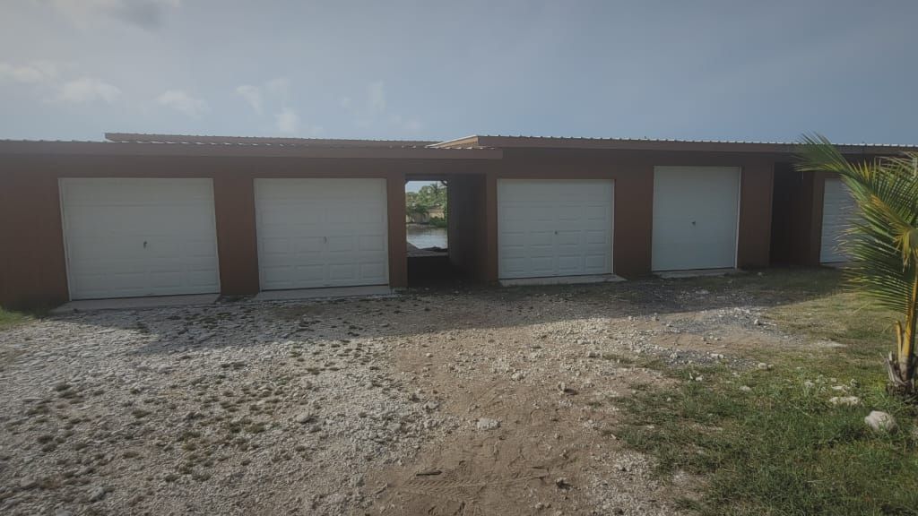 Listing ID: URE0371, Coconut Cove Utila, Bay Islands, HN - Coconut Cove Boat Slip & Garage, Photo #