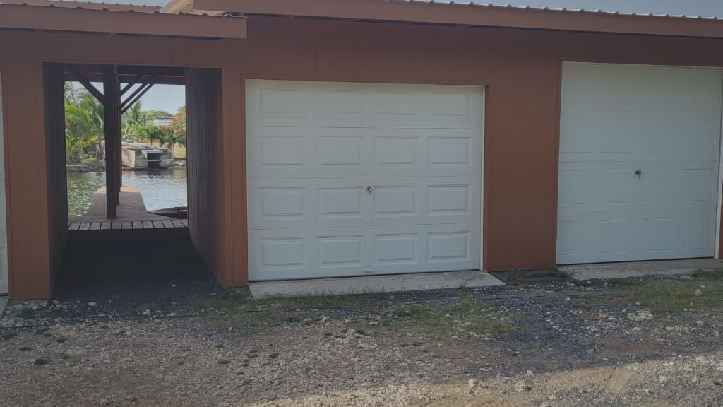 Listing ID: URE0371, Coconut Cove Utila, Bay Islands, HN - Coconut Cove Boat Slip & Garage, Photo #