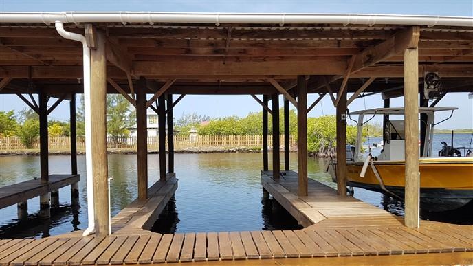 Listing ID: URE0689, The Palms, Blue Bayou Utila, Bay Islands, HN - Boat Slip With Garage At The Palms, Photo #