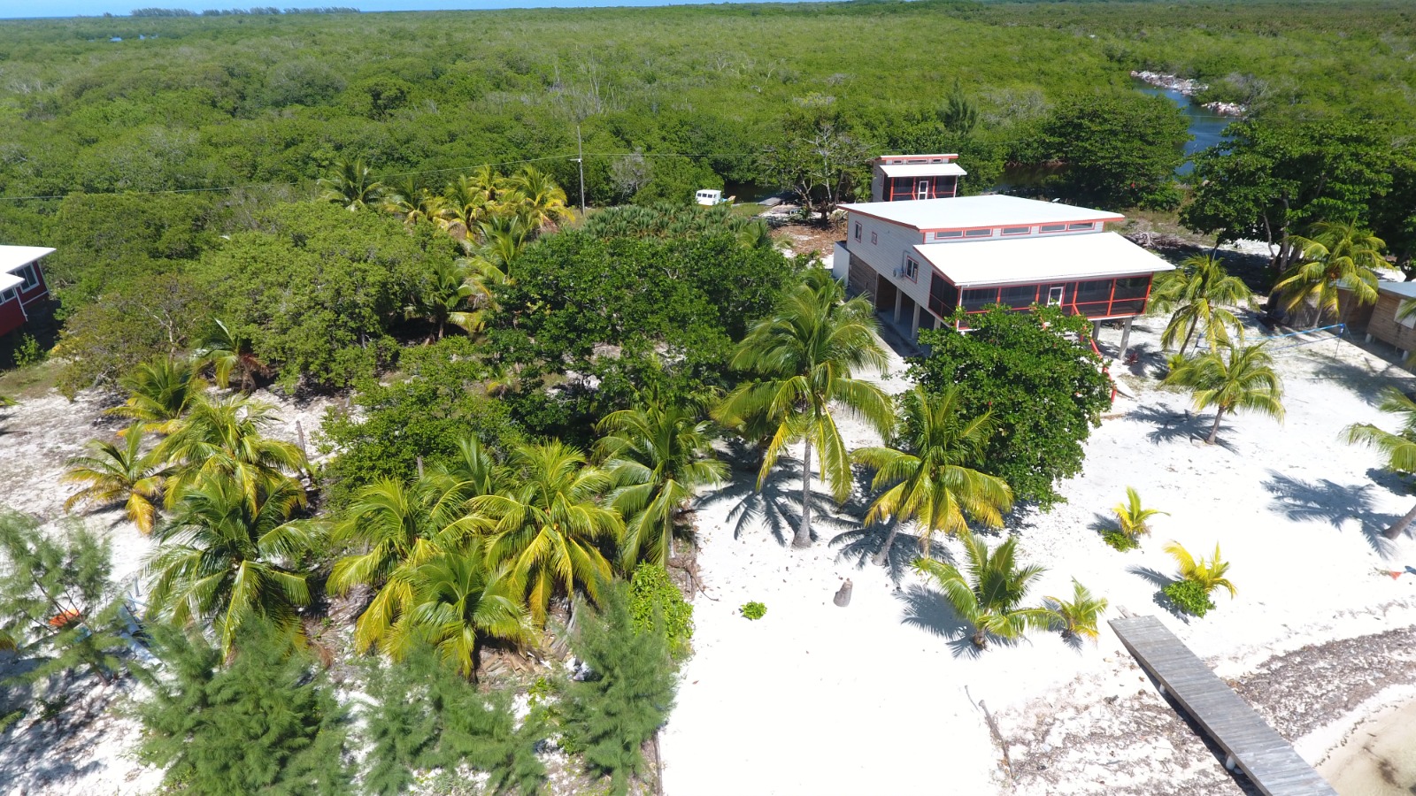 Listing ID: URE0693, Holland Beach Utila, Bay Islands, HN - Oceanfront property with small bodega and boat dock, Photo #