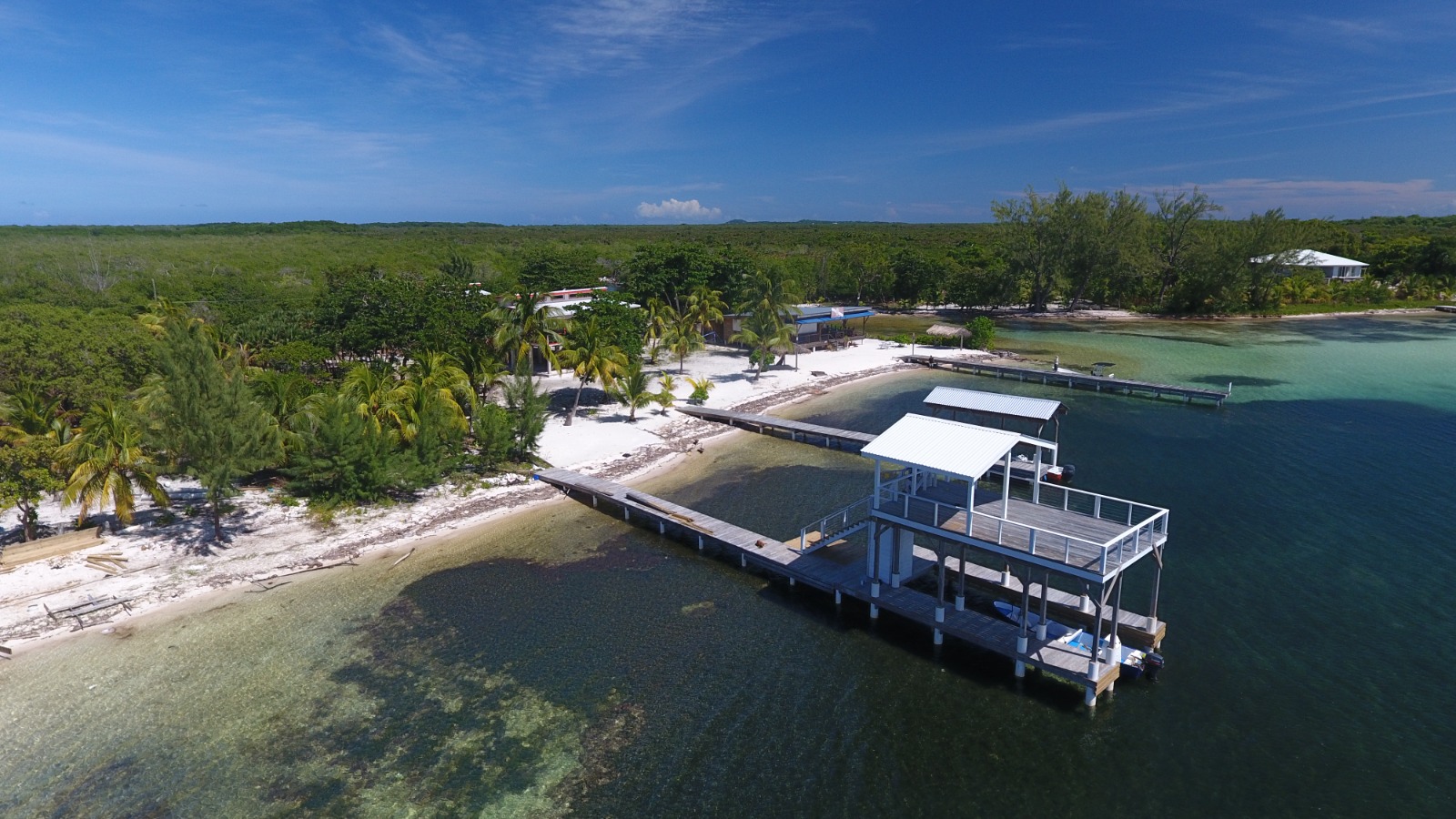 Listing ID: URE0693, Holland Beach Utila, Bay Islands, HN - Oceanfront property with small bodega and boat dock, Photo #