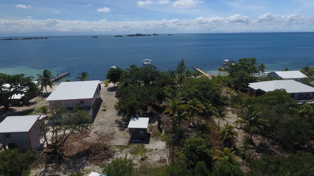 Listing ID: URE0695, Holland Beach Utila, Bay Islands, HN - Waterfront Property with Covered Boat Lift & Deck, Photo #